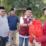 HUT Ke 50, PPNI Palopo Serahkan Bingkisan Sembako Pada Warga Kurang Mampu